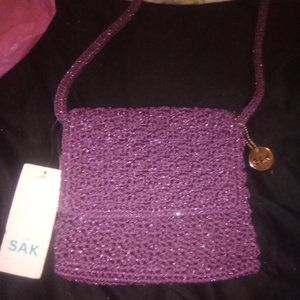 The SAK purple cross body purse